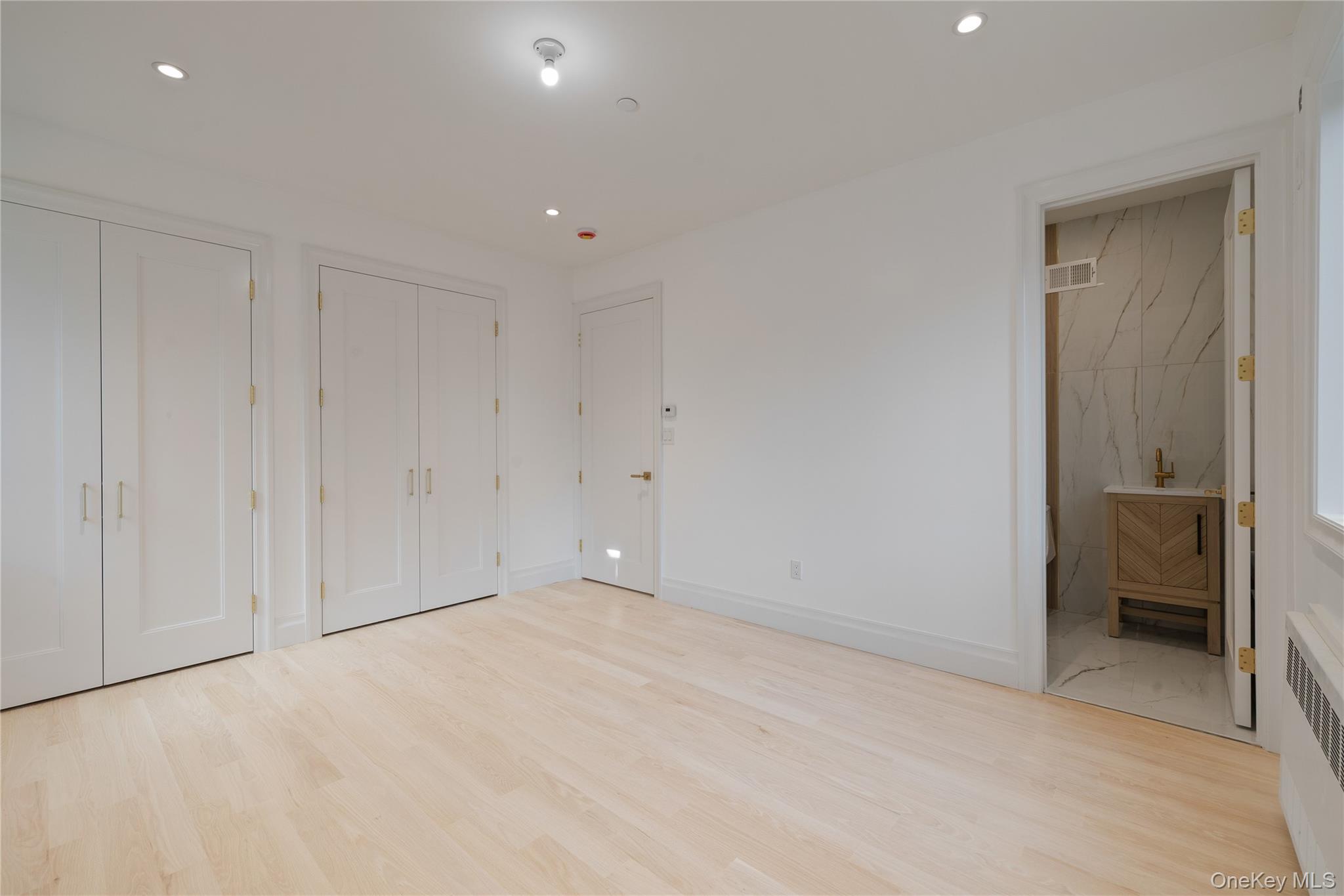 27 Ellish Parkway, Unit 103 Spring Valley, NY 10977 - Photo 11 of 23 Primary bedroom