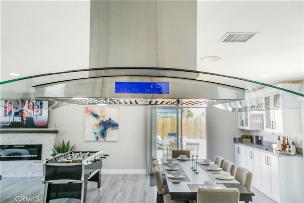 39120 Paradise Way Cathedral City, CA 92234 - Photo 14 of 41 a view of a dining room with furniture and wooden floor