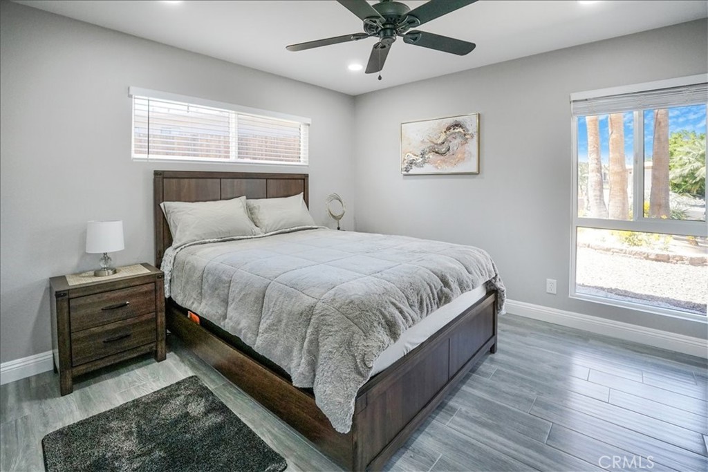 39120 Paradise Way Cathedral City, CA 92234 - Photo 21 of 41 a large bed sitting in a bedroom next to a window