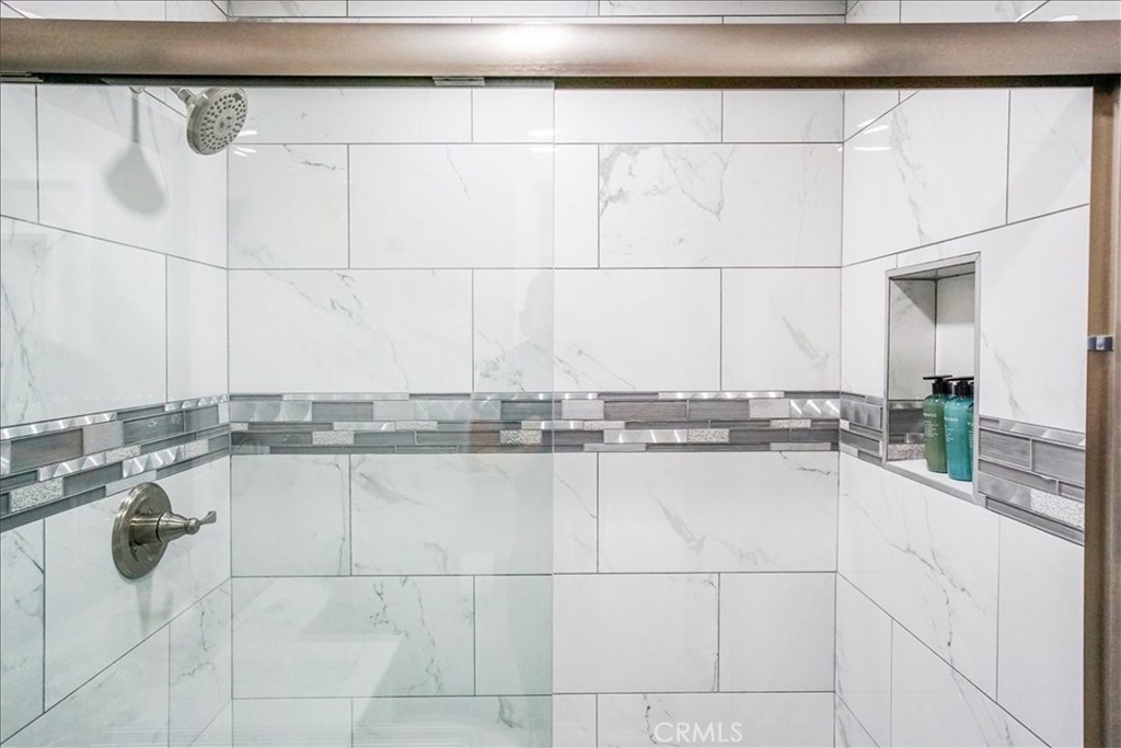 39120 Paradise Way Cathedral City, CA 92234 - Photo 24 of 41 a kitchen with a sink and white cabinets