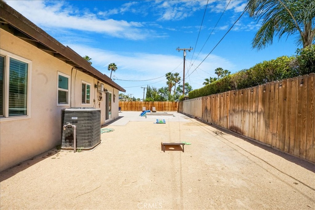 39120 Paradise Way Cathedral City, CA 92234 - Photo 35 of 41 a view of a backyard with potted plants