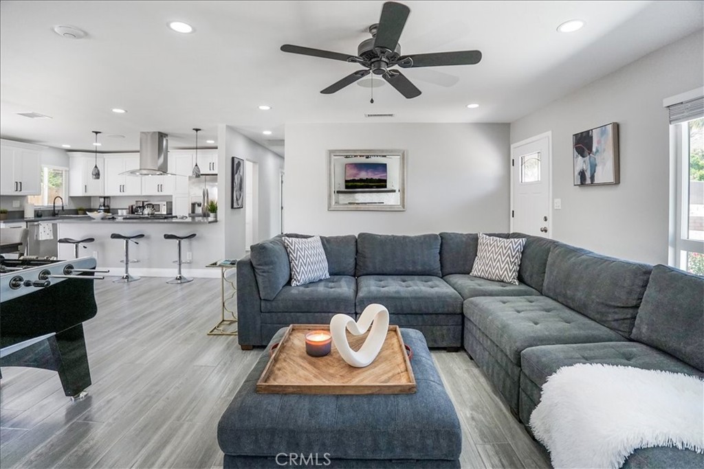 39120 Paradise Way Cathedral City, CA 92234 - Photo 4 of 41 a living room with furniture and a wooden floor