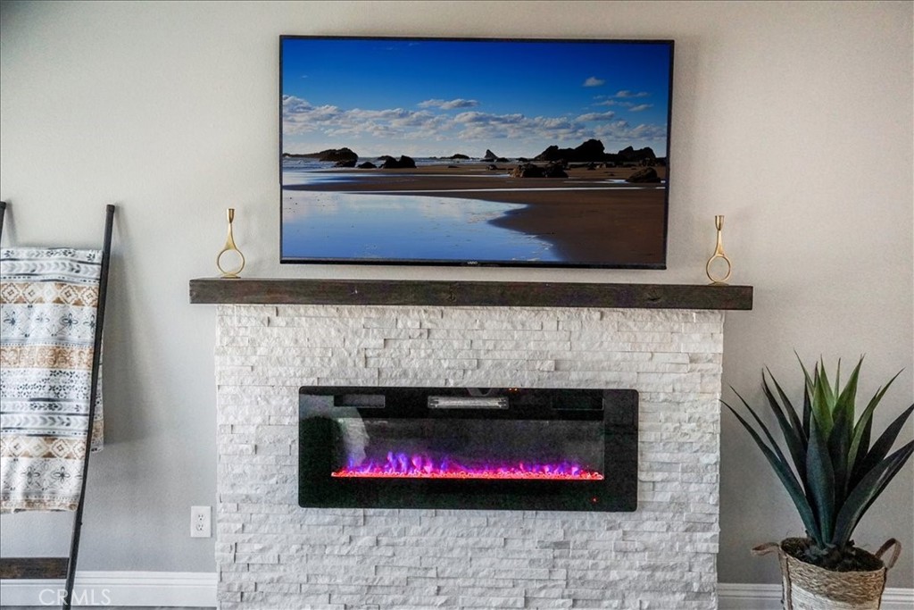 39120 Paradise Way Cathedral City, CA 92234 - Photo 6 of 41 a front view of a fireplace with a sink