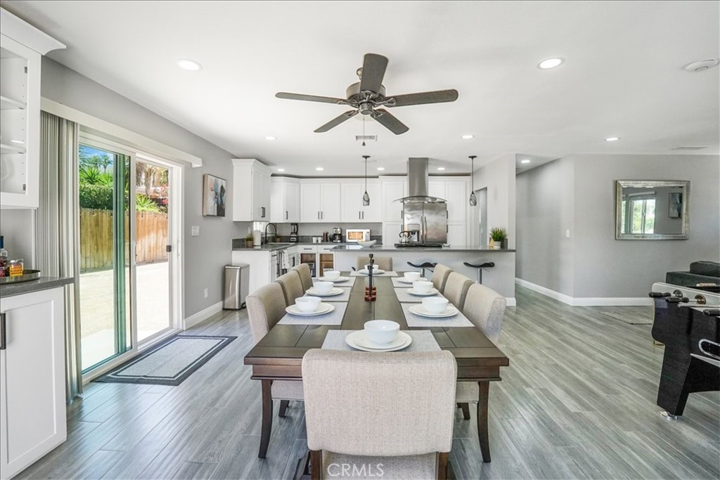 39120 Paradise Way Cathedral City, CA 92234 - Photo 7 of 41 a view of a dining room with furniture window and wooden floor