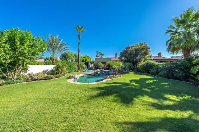 a view of a golf course with a garden