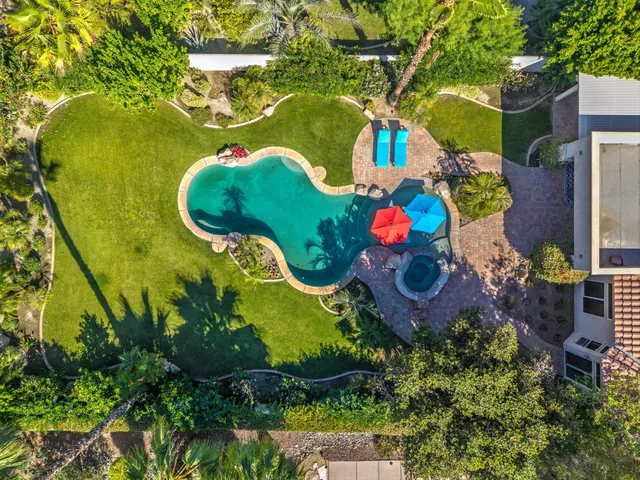 an aerial view of a swimming pool