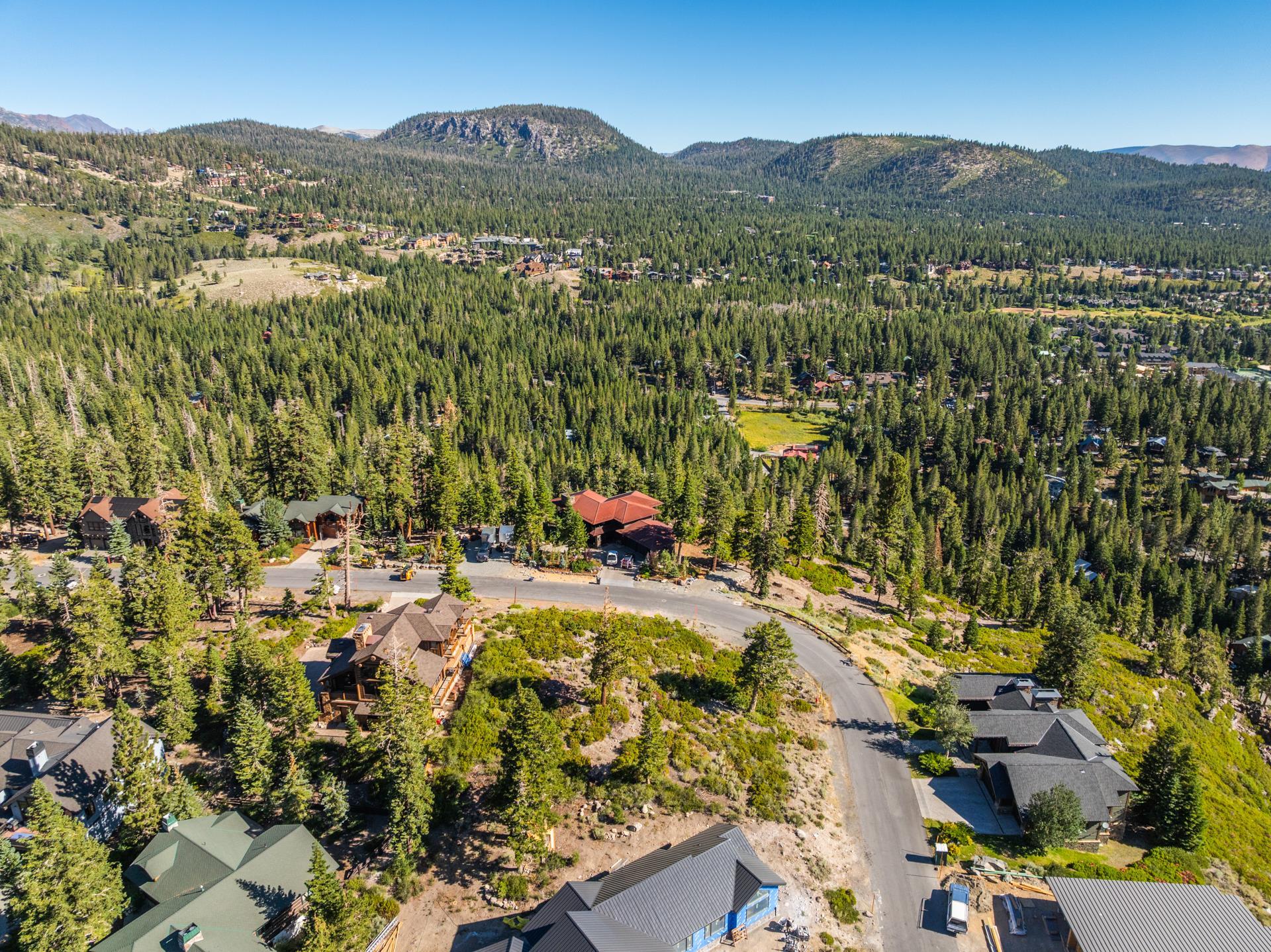 480 Fir Street Mammoth Lakes, CA 93546 - Photo 11 of 36 Aerial view of property and surrounding area with mountains