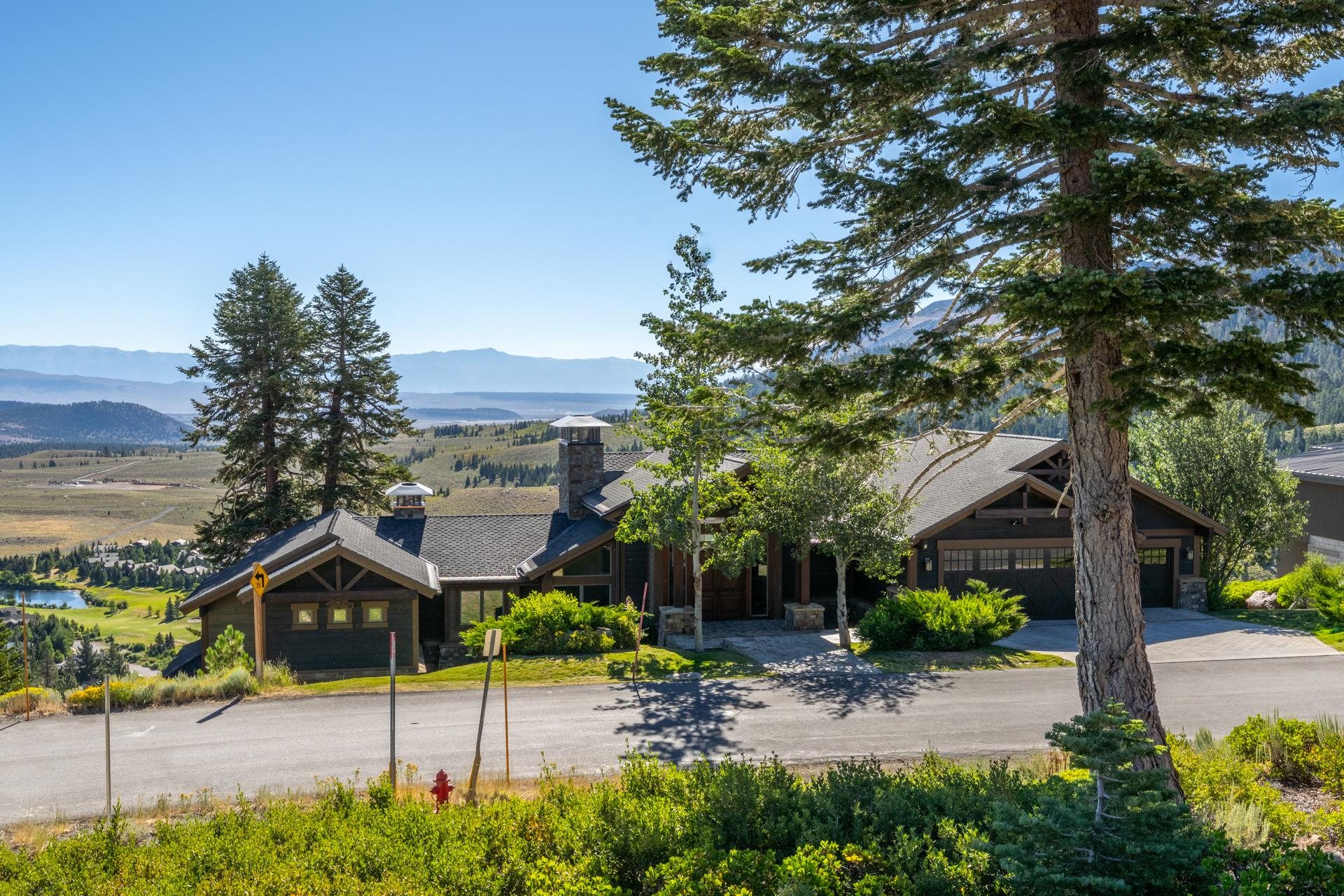480 Fir Street Mammoth Lakes, CA 93546 - Photo 23 of 36 View of front facade with a chimney and a mountain view