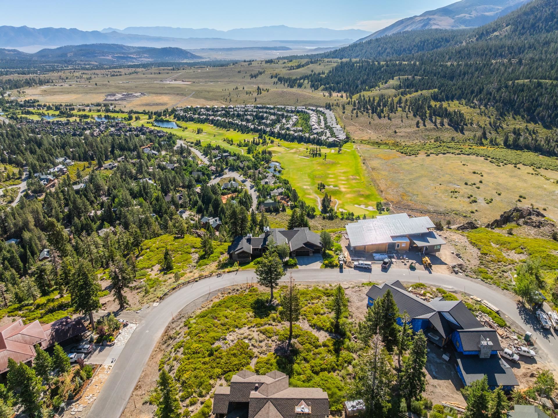480 Fir Street Mammoth Lakes, CA 93546 - Photo 8 of 36 Aerial view of residential area featuring a mountainous background