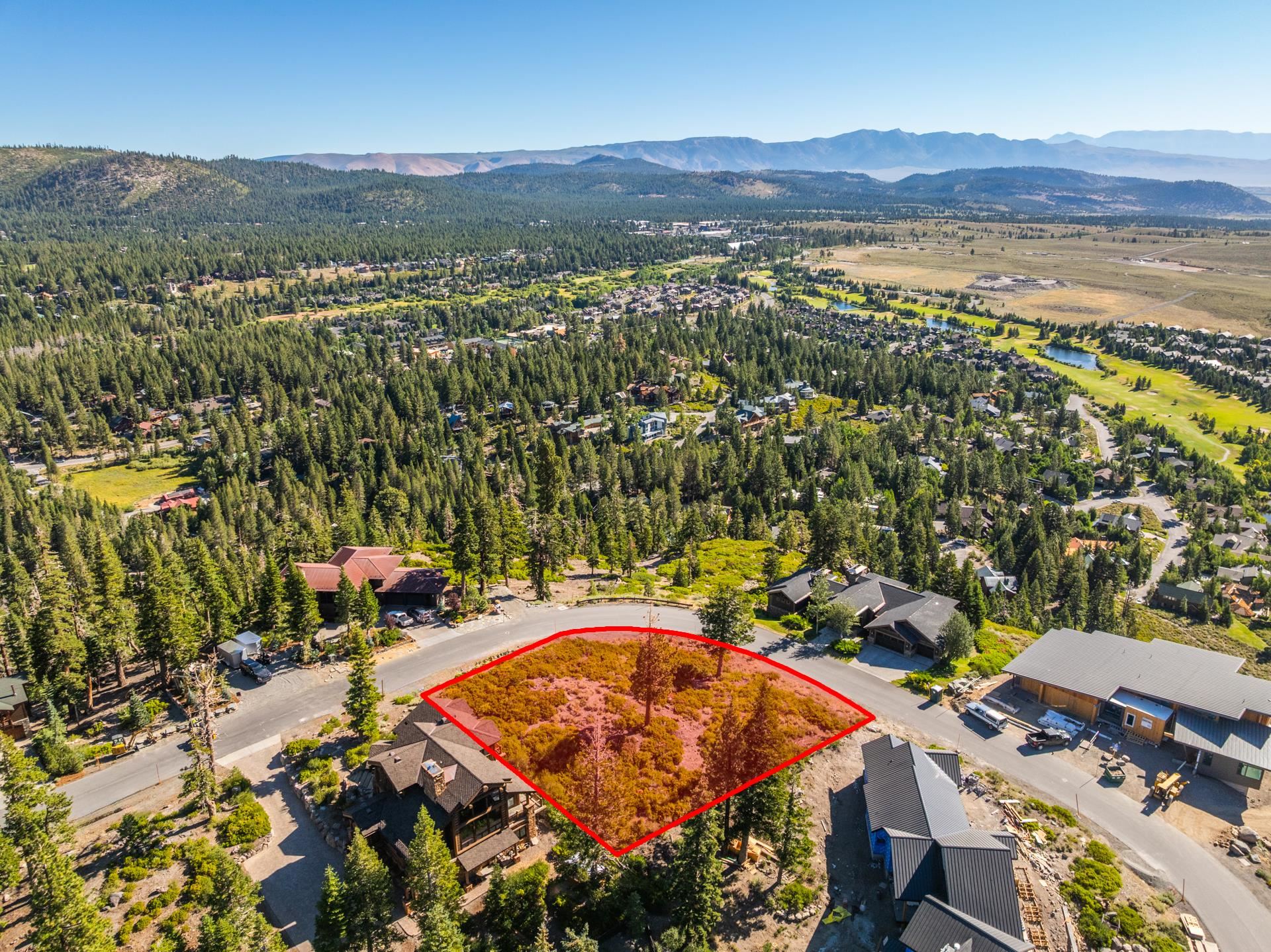 480 Fir Street Mammoth Lakes, CA 93546 - Photo 10 of 36 Aerial view of property and surrounding area featuring a mountainous background and property parcel outlined