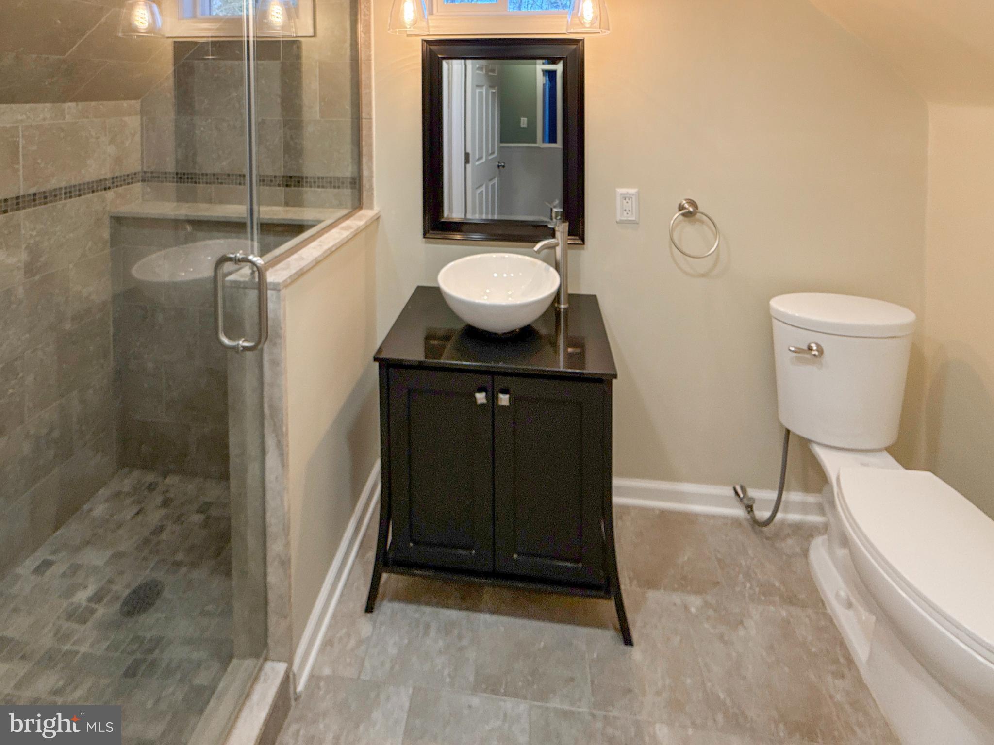 133 North Line Road Newtown Square, PA 19073 - Photo 15 of 23 a bathroom with a sink a toilet and shower