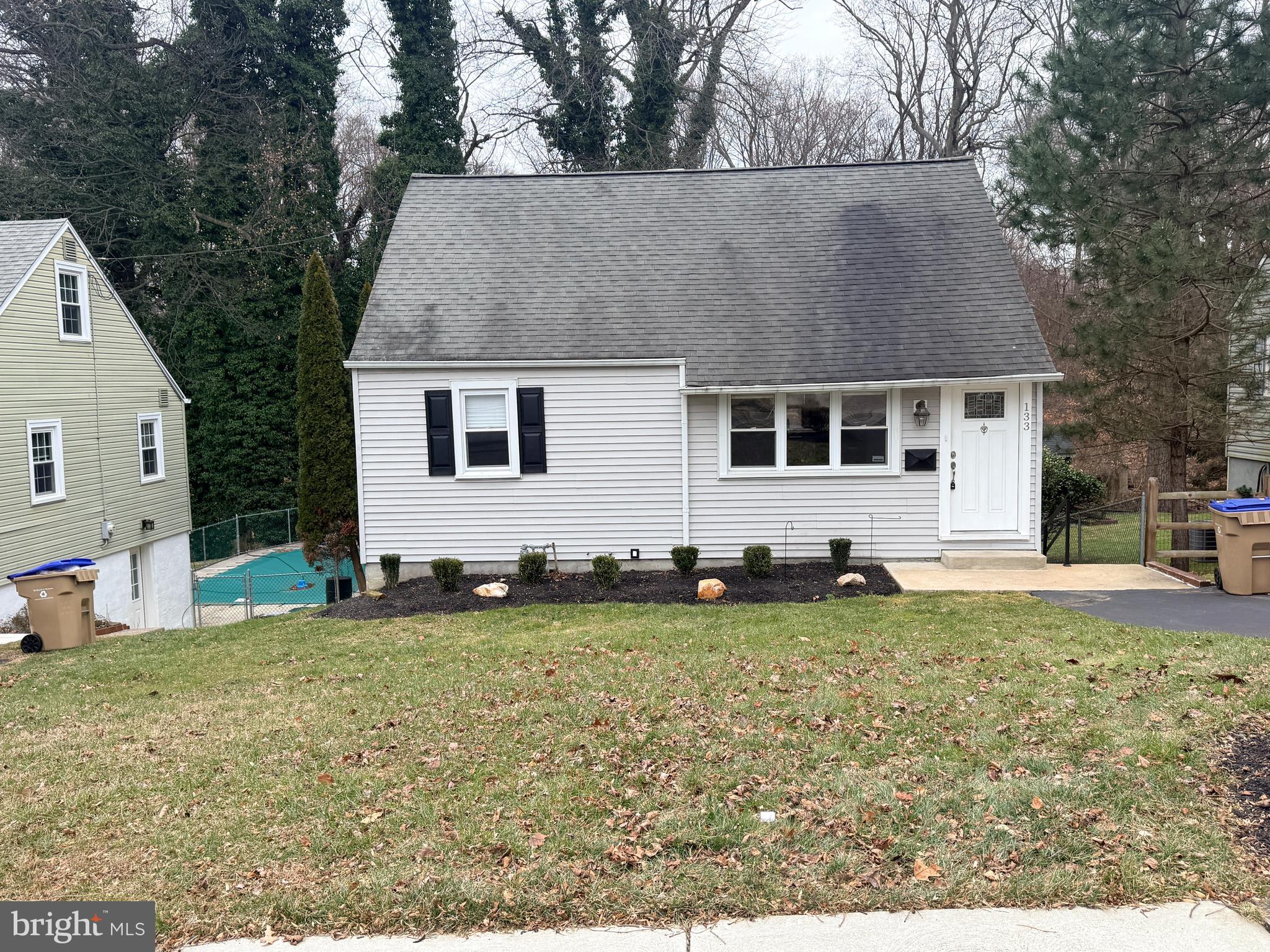 133 North Line Road Newtown Square, PA 19073 - Photo 2 of 23 a backyard of a house with table and chairs