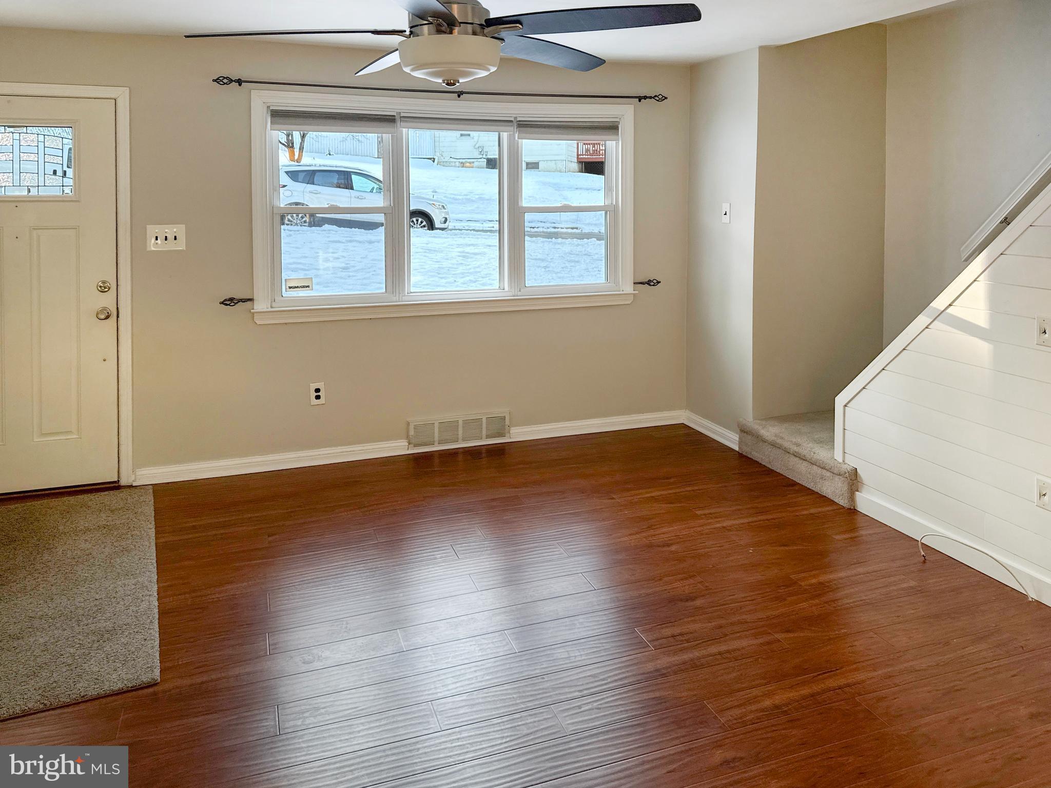 133 North Line Road Newtown Square, PA 19073 - Photo 3 of 23 wooden floor in an empty room with a window