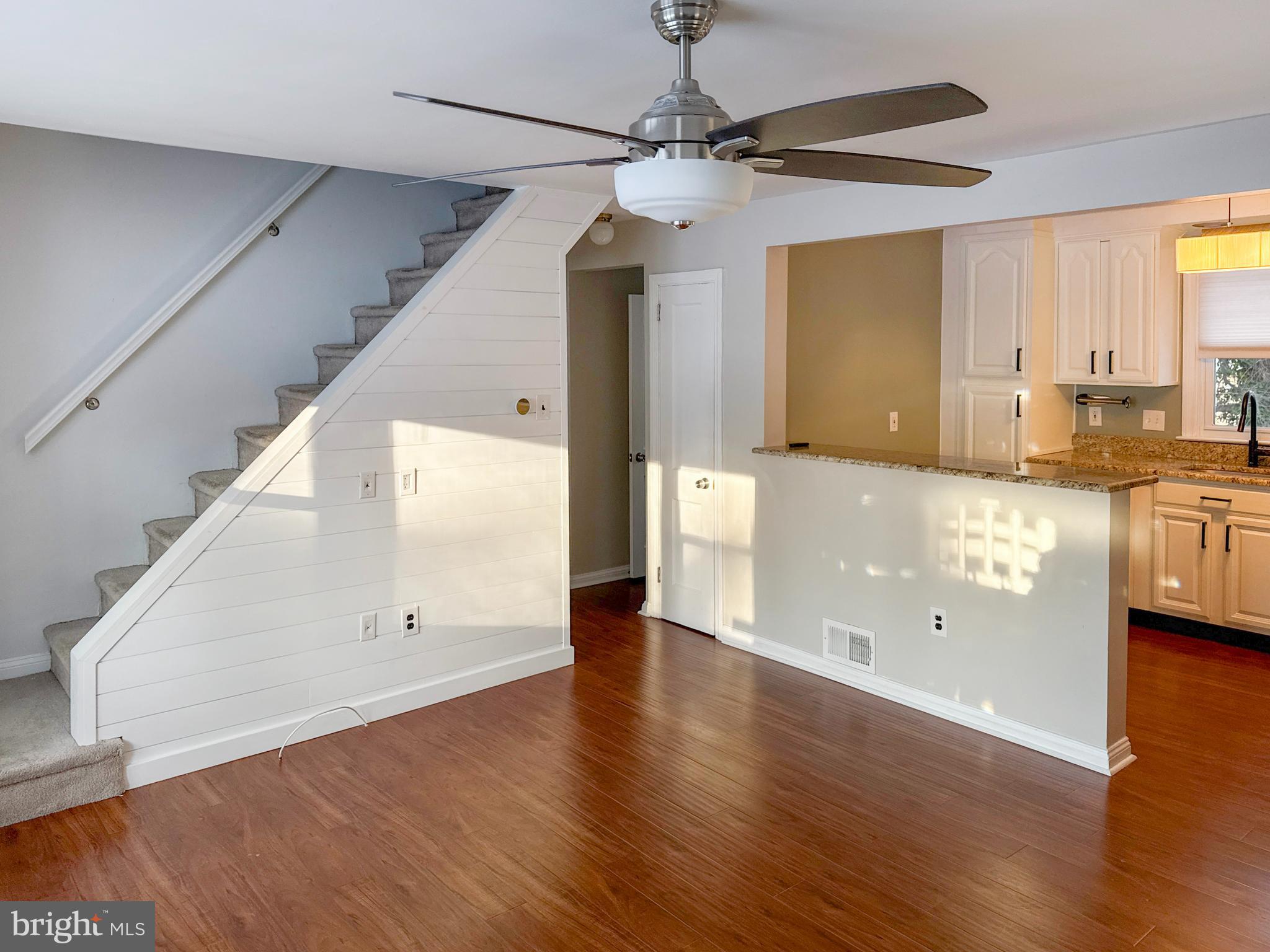 133 North Line Road Newtown Square, PA 19073 - Photo 4 of 23 a view of a kitchen with a sink and wooden floor