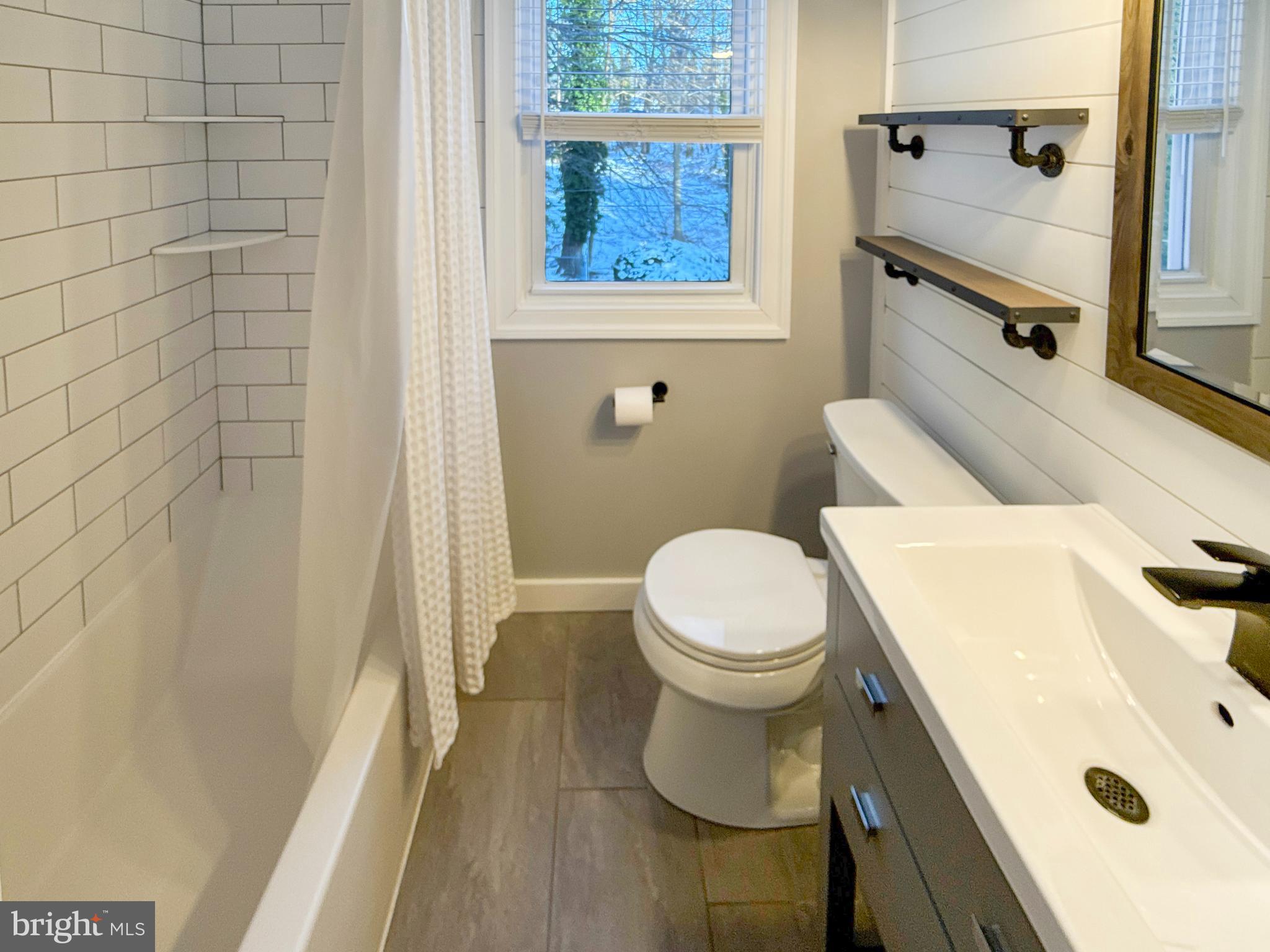 133 North Line Road Newtown Square, PA 19073 - Photo 7 of 23 a white toilet sitting next to a bathroom sink