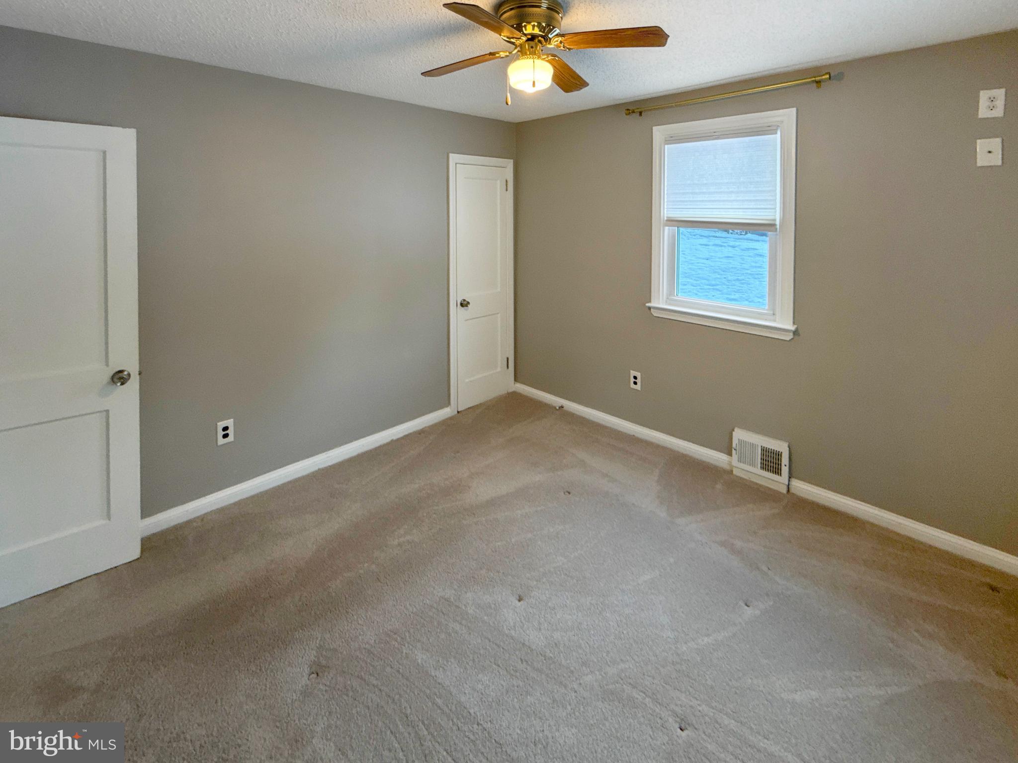 133 North Line Road Newtown Square, PA 19073 - Photo 8 of 23 a view of an empty room with a window