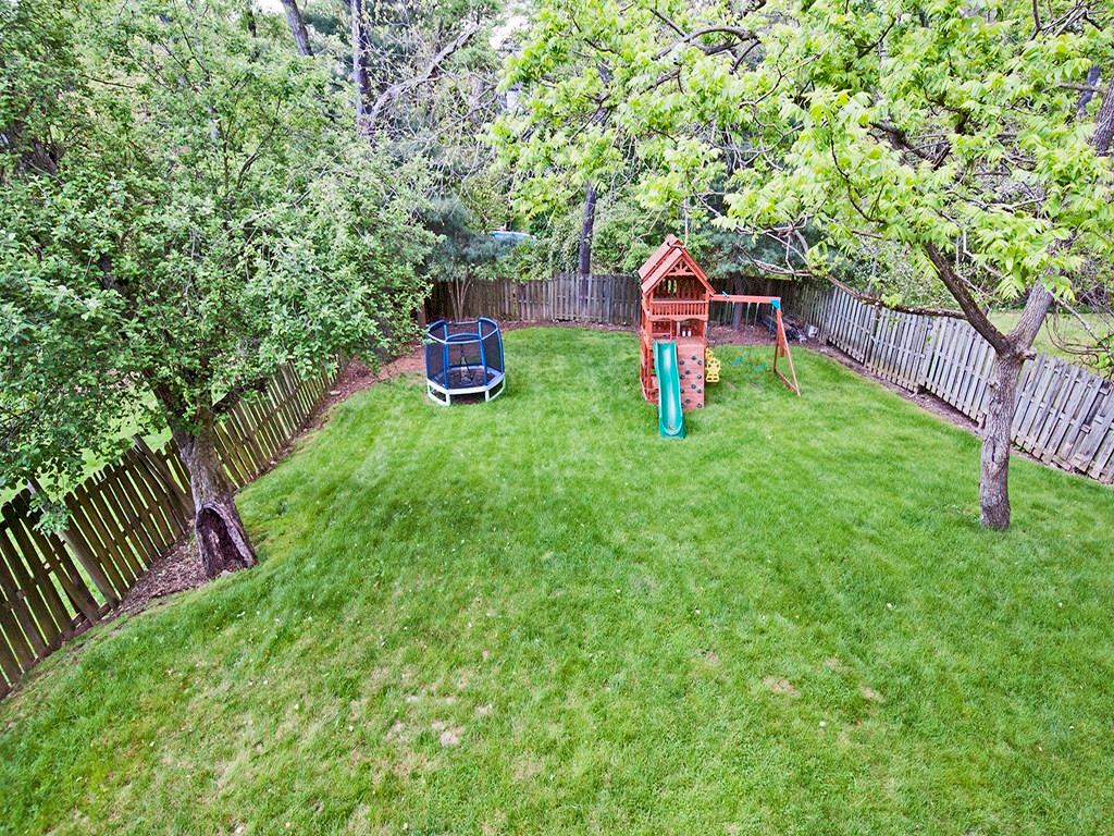 1350 Washington Road Mt. Lebanon, PA 15228 - Photo 18 of 18 Picture perfect treed and fenced- in back yard with a jungle gym.