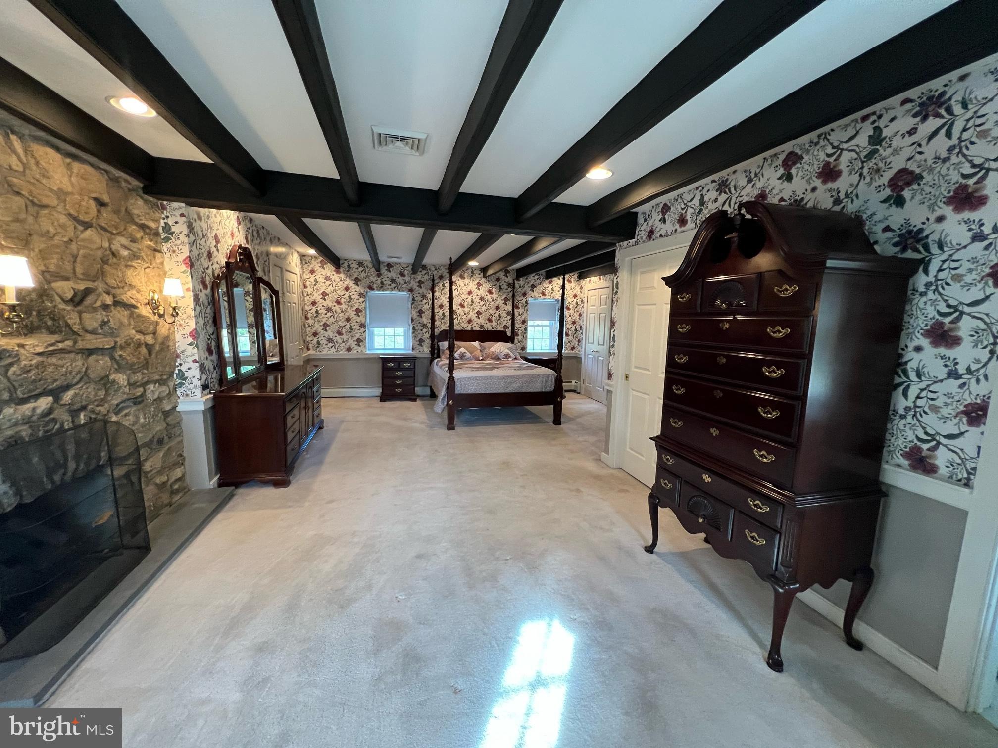 908 Lincoln Road Phoenixville, PA 19460 - Photo 18 of 26 Elegant bedroom with rustic charm.