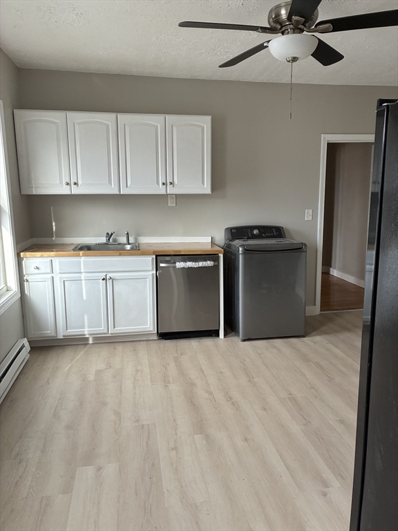 82 Green Hill Parkway Worcester, MA 01605 - Photo 30 of 42 a kitchen with stainless steel appliances granite countertop a stove a sink and a refrigerator