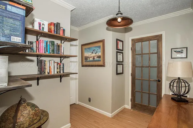 a view of a livingroom with furniture and wooden floor