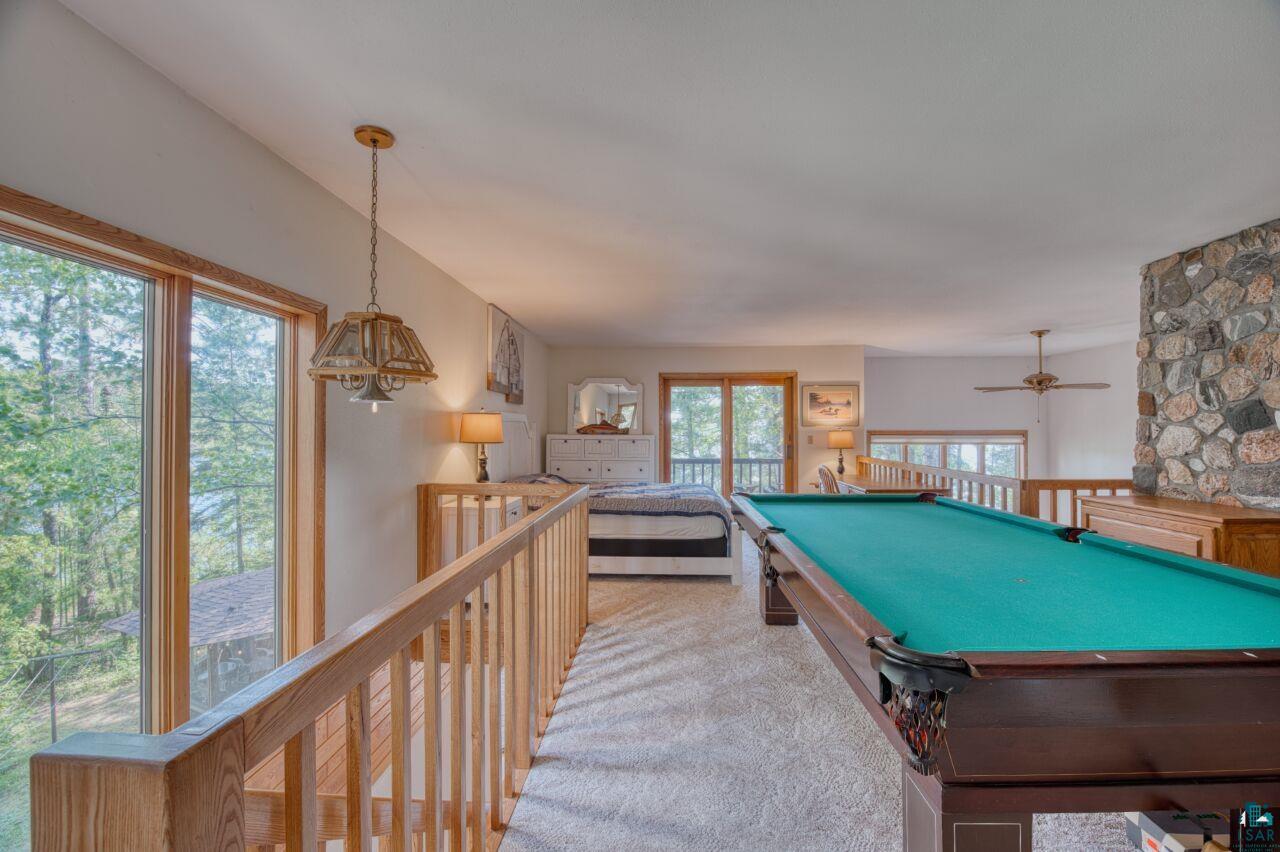 6312 Juniper Lane Gilbert, MN 55741 - Photo 22 of 50 Game room with light colored carpet, ceiling fan, and pool table
