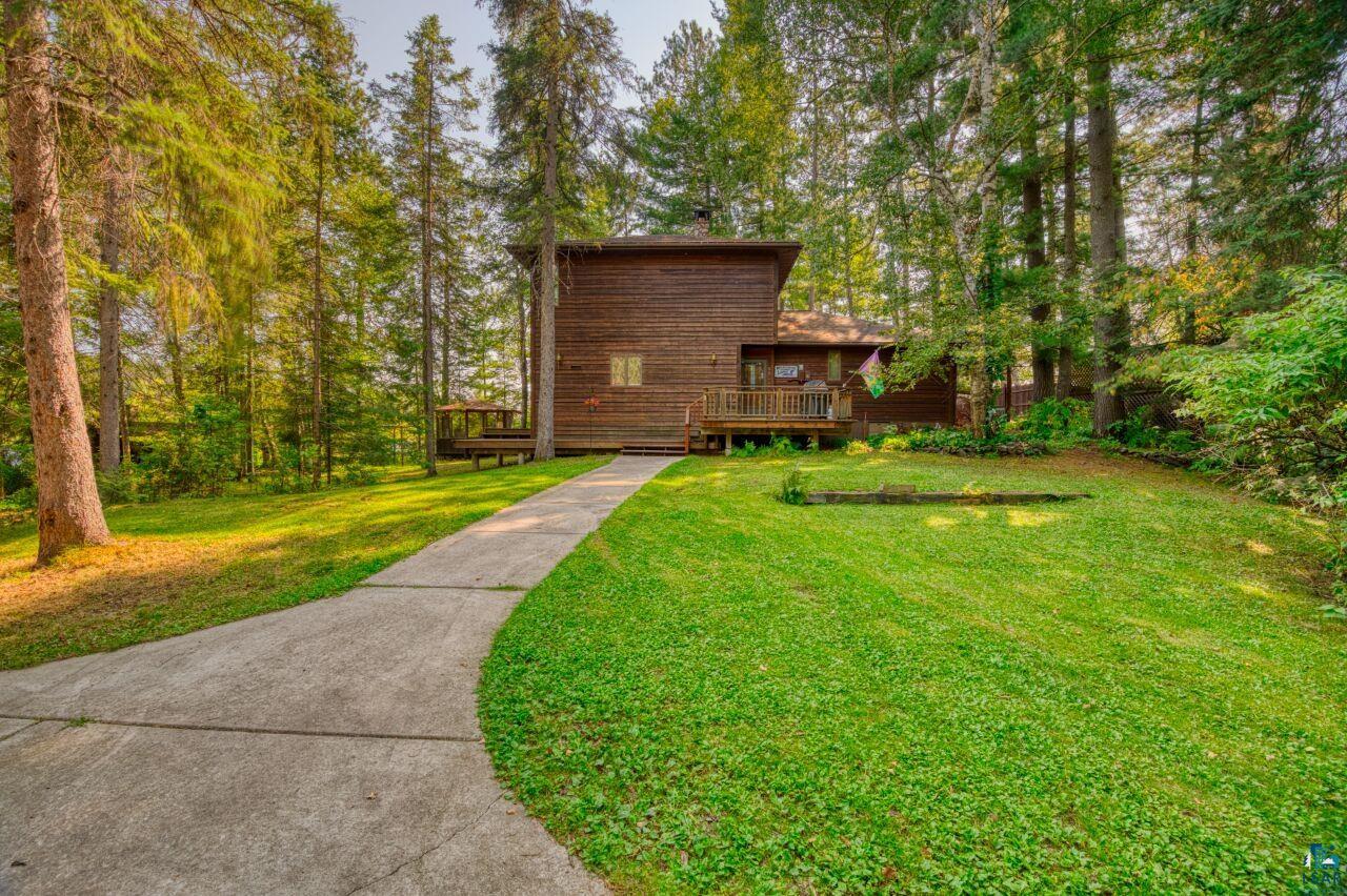 6312 Juniper Lane Gilbert, MN 55741 - Photo 50 of 50 View of front of house featuring a wooden deck and a front yard