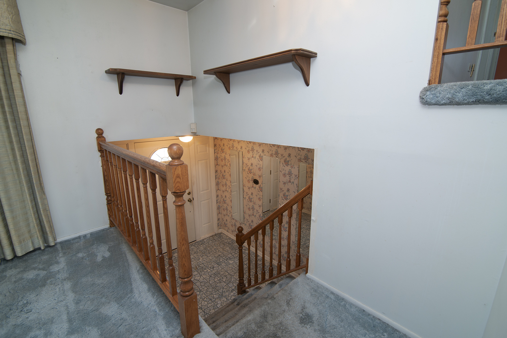 81 Ambleside Road Des Plaines, IL 60016 - Photo 3 of 24 a view of a hallway with stairs