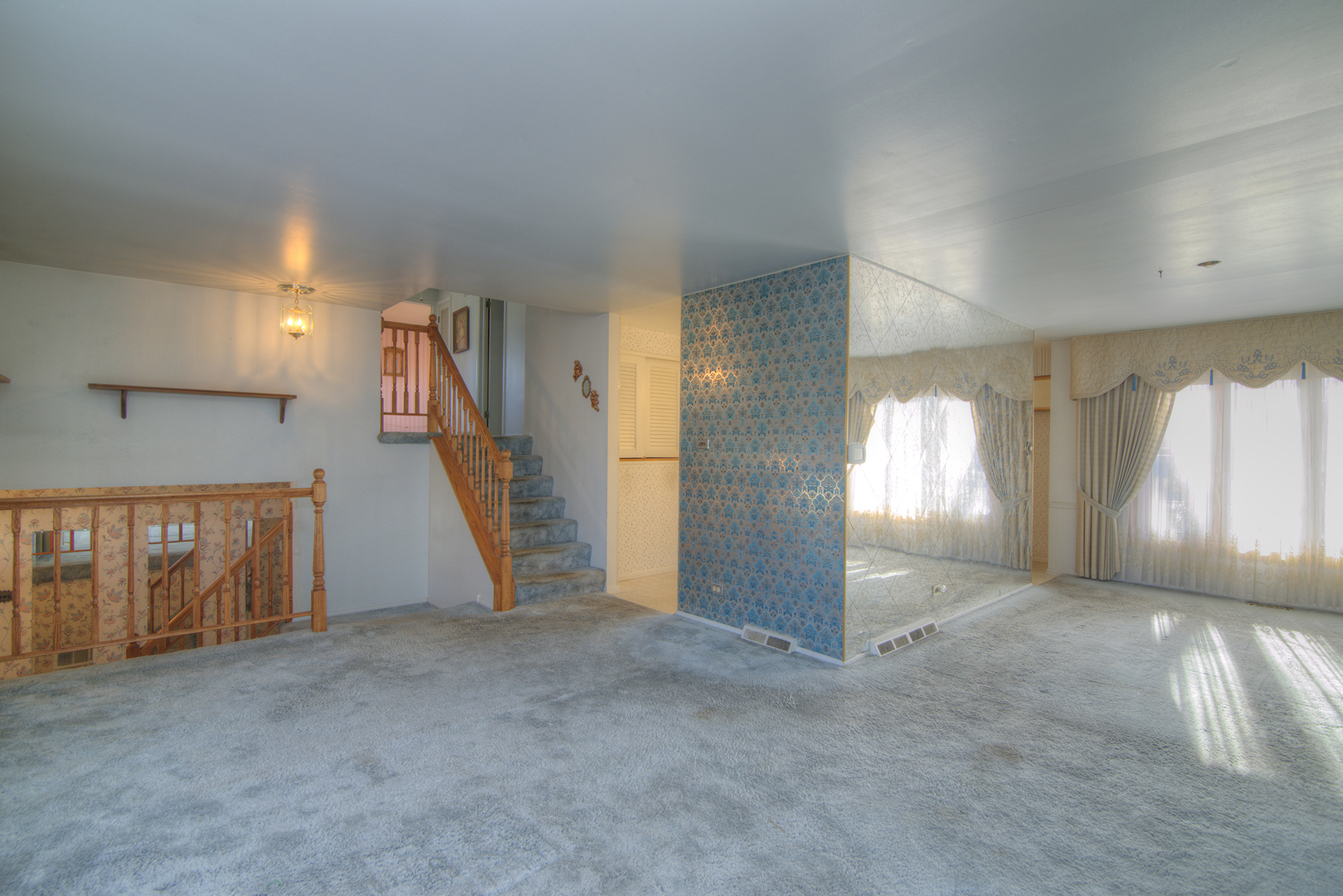 81 Ambleside Road Des Plaines, IL 60016 - Photo 5 of 24 a view of empty room with windows