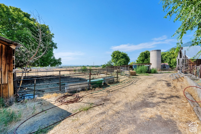1632 South Main Street Springville, UT 84663 - Photo 43 of 93 View of yard featuring an exterior structure, a rural view, and an outdoor structure