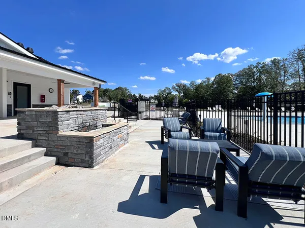 a view of kitchen with dining table and chairs