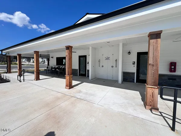 a view of a hall with living room