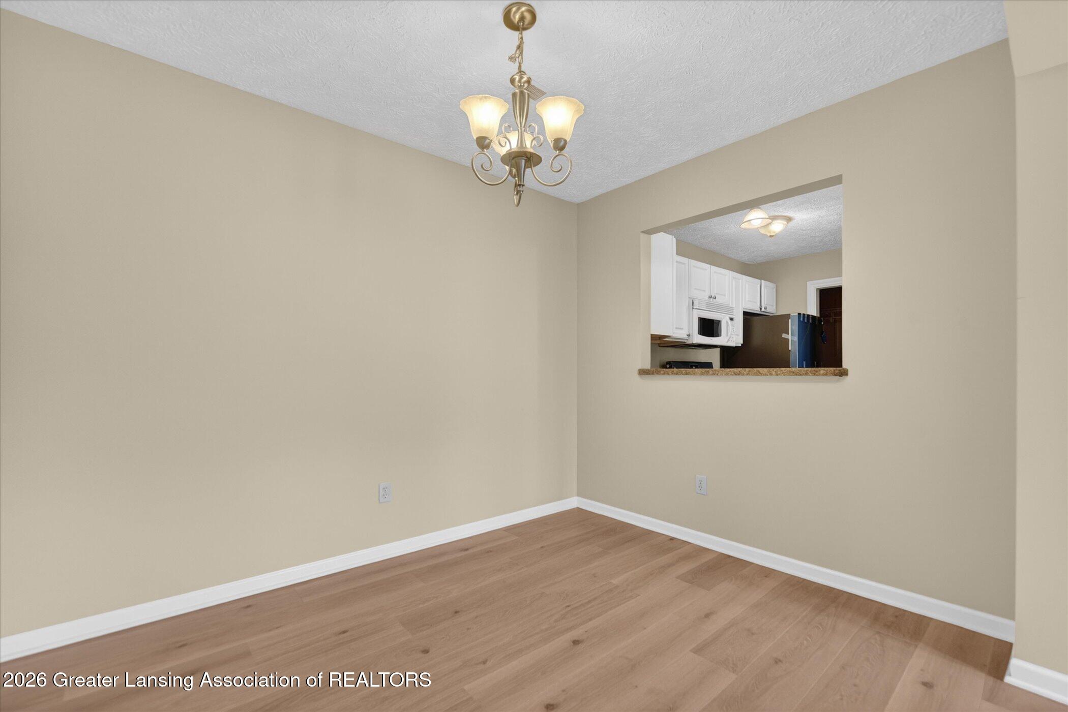 1337 Coolidge Road, Unit 16 East Lansing, MI 48823 - Photo 9 of 31 09-1337-Coolidge-Rd-WindowStill