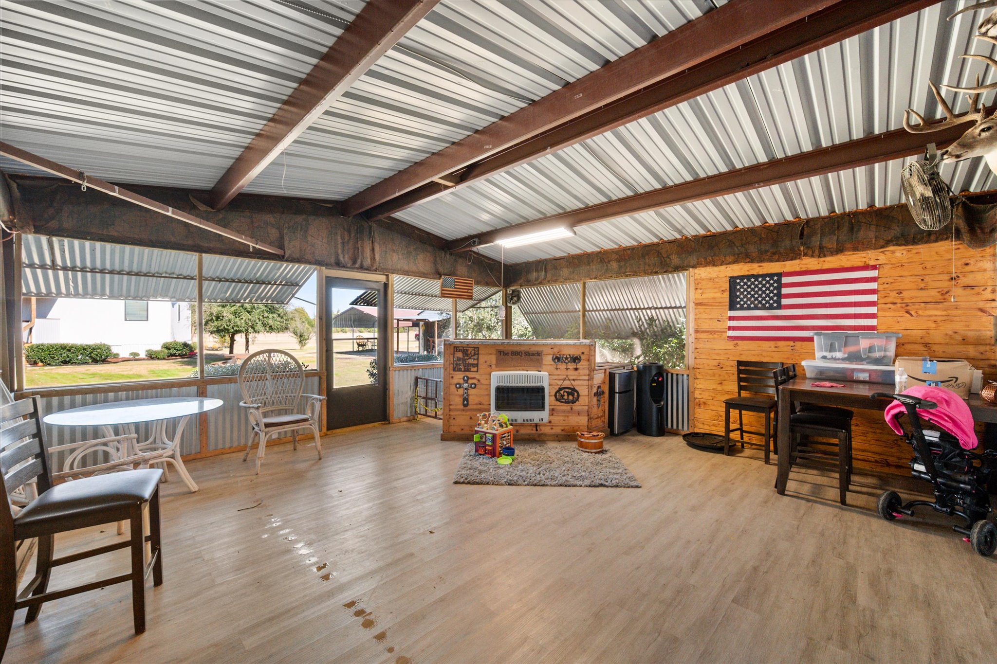 16857 Fm 639 Road East Purdon, TX 76679 - Photo 5 of 38 Sunroom / solarium with heating unit and plenty of natural light