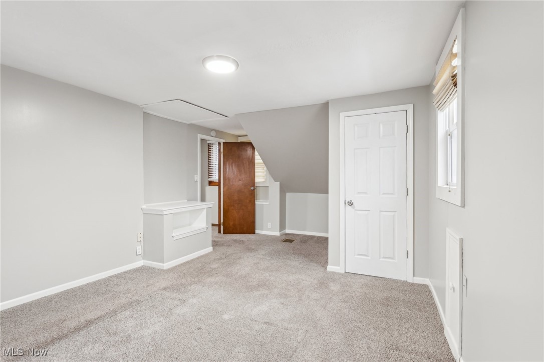 1573 Roselawn Road Cleveland, OH 44124 - Photo 17 of 25 Additional living space featuring light carpet