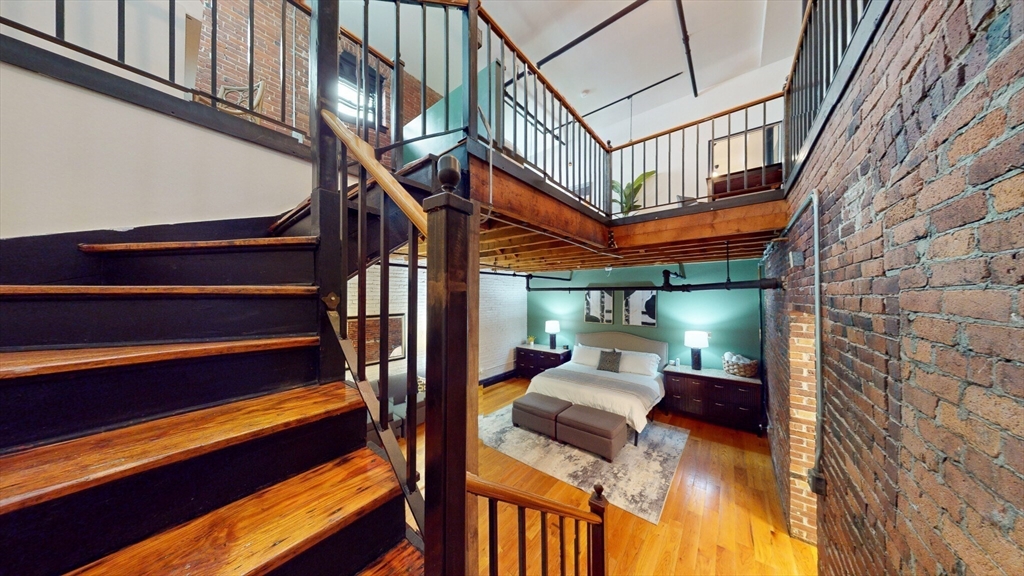 19 Stanhope Street, Unit 1B Boston, MA 02116 - Photo 16 of 20 a backyard of a house with seating space