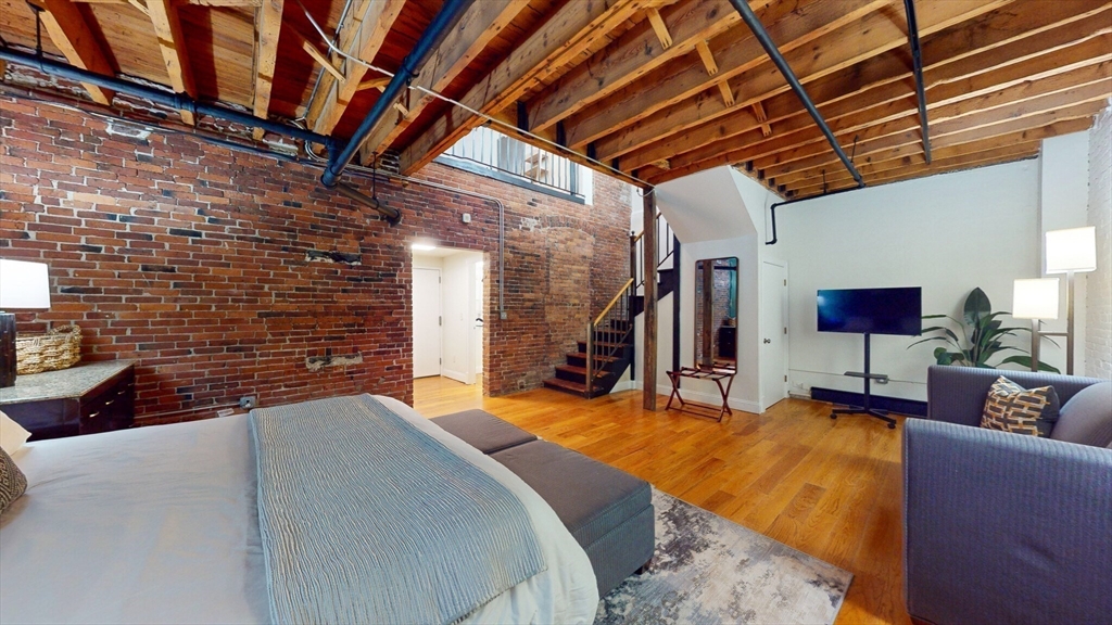 19 Stanhope Street, Unit 1B Boston, MA 02116 - Photo 17 of 20 a view of a livingroom with furniture