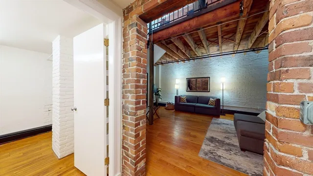 a view of a living room with furniture