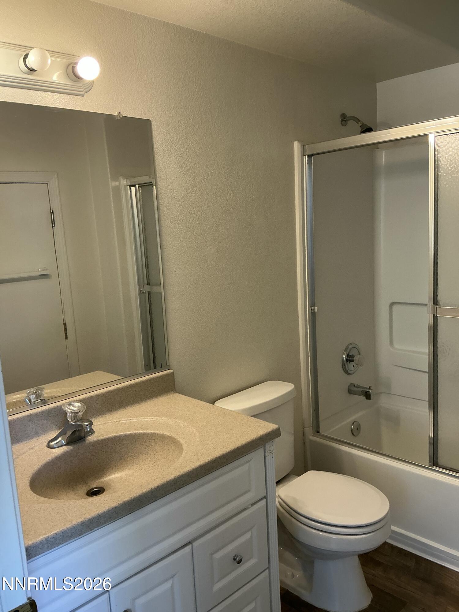 330 Stewart Street Reno, NV 89502 - Photo 17 of 21 a bathroom with a sink toilet and shower