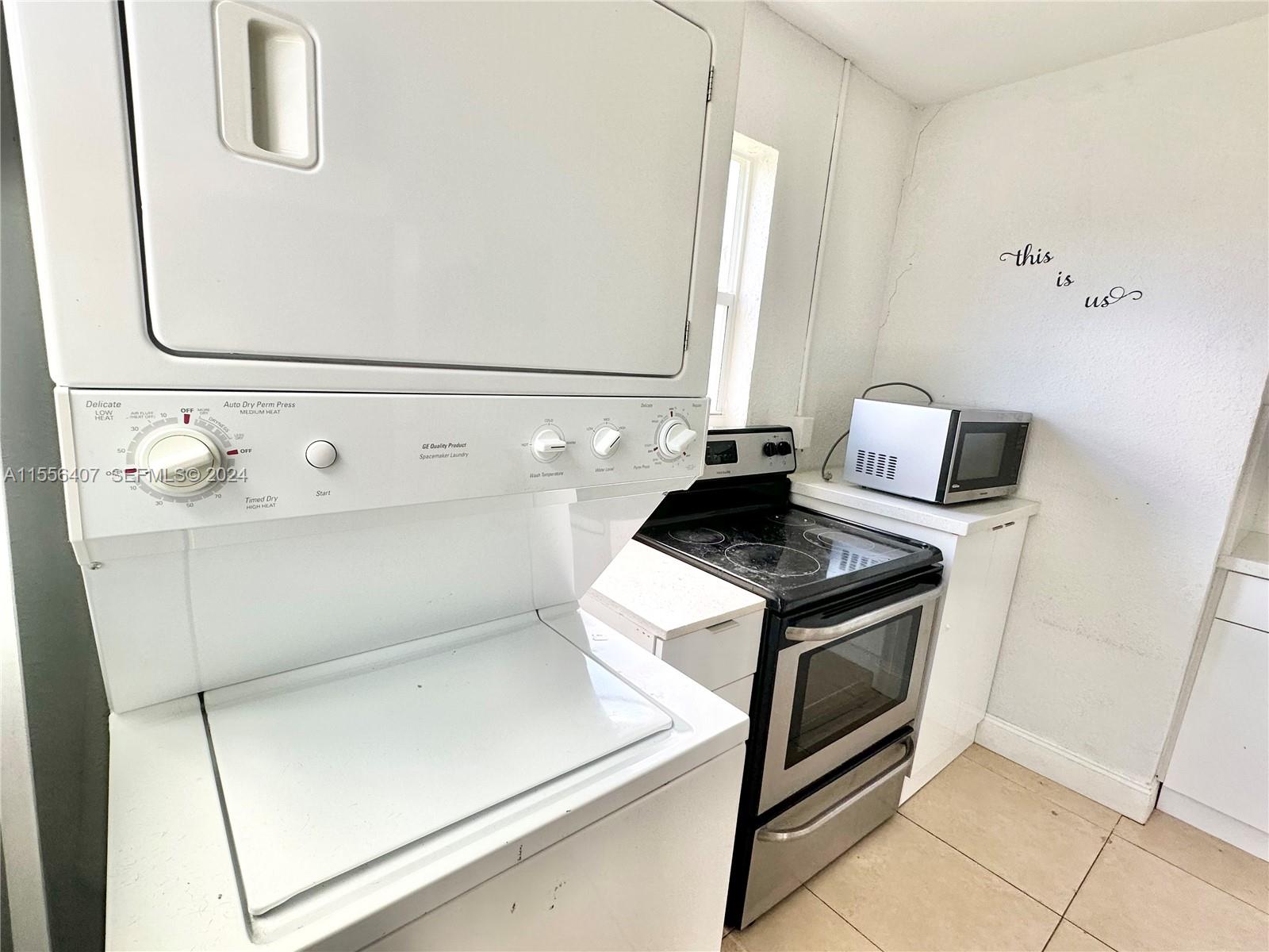 3730 S Avenue South, Unit 1 Riviera Beach, FL 33404 - Photo 3 of 12 a utility room with dryer and washer