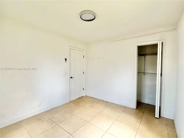 a view of a room with rack on the wall