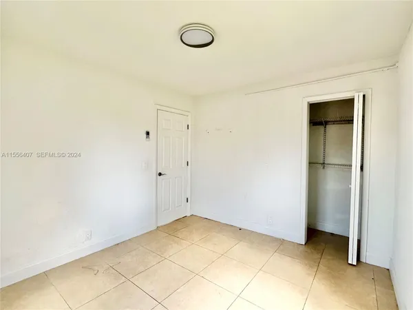 a view of a room with rack on the wall