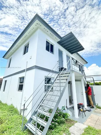 a view of a house with a patio