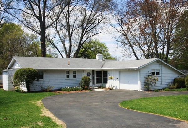 19 Cherry Road Framingham, MA 01701 - Photo 1 of 23 a front view of a house with a garden