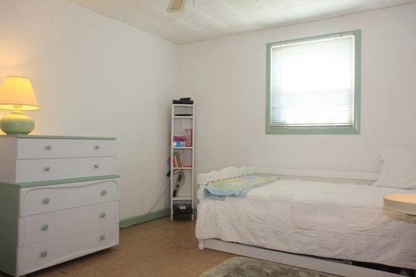 19 Cherry Road Framingham, MA 01701 - Photo 13 of 23 a bedroom with a bed and a window