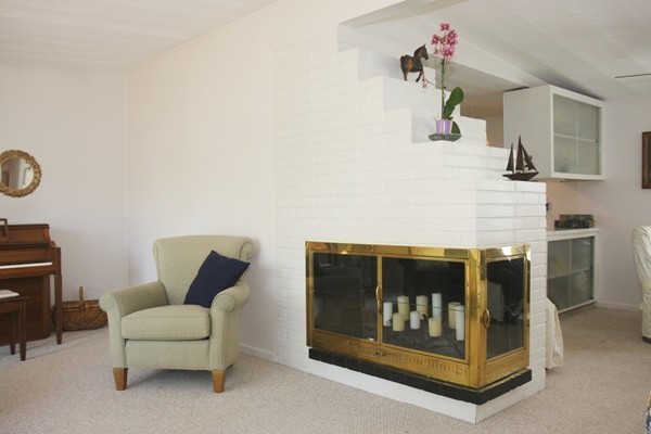 19 Cherry Road Framingham, MA 01701 - Photo 5 of 23 a living room with furniture and a fireplace