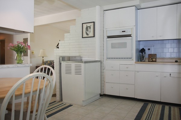19 Cherry Road Framingham, MA 01701 - Photo 10 of 23 a view of a kitchen with cabinets