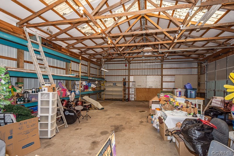 2093 Venter Road Aylett, VA 23009 - Photo 44 of 48 Garage with tons of storage space and built in shelving