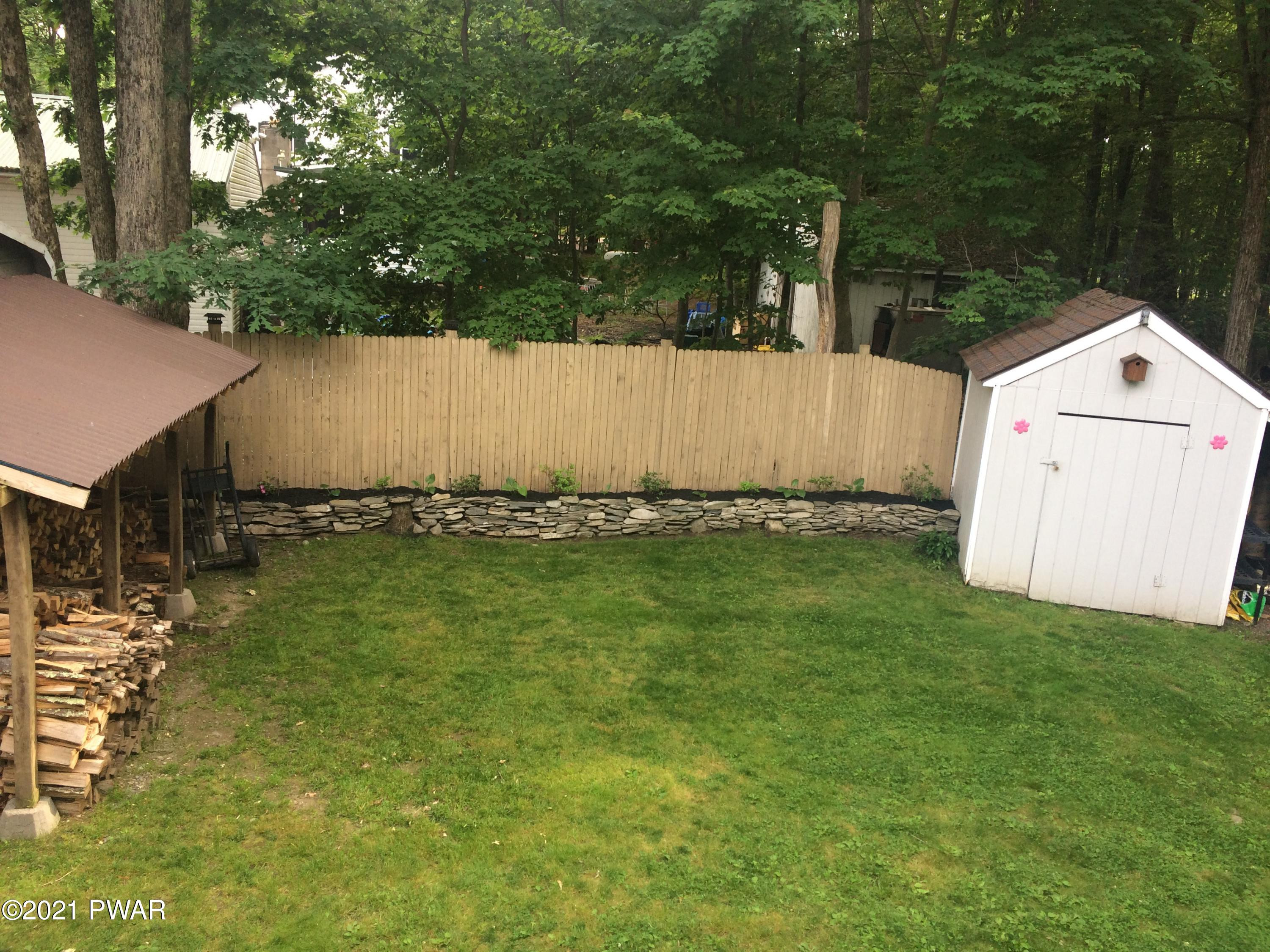 109 Roundhill Road Dingmans Ferry, PA 18328 - Photo 28 of 33 FENCED IN YARD 4