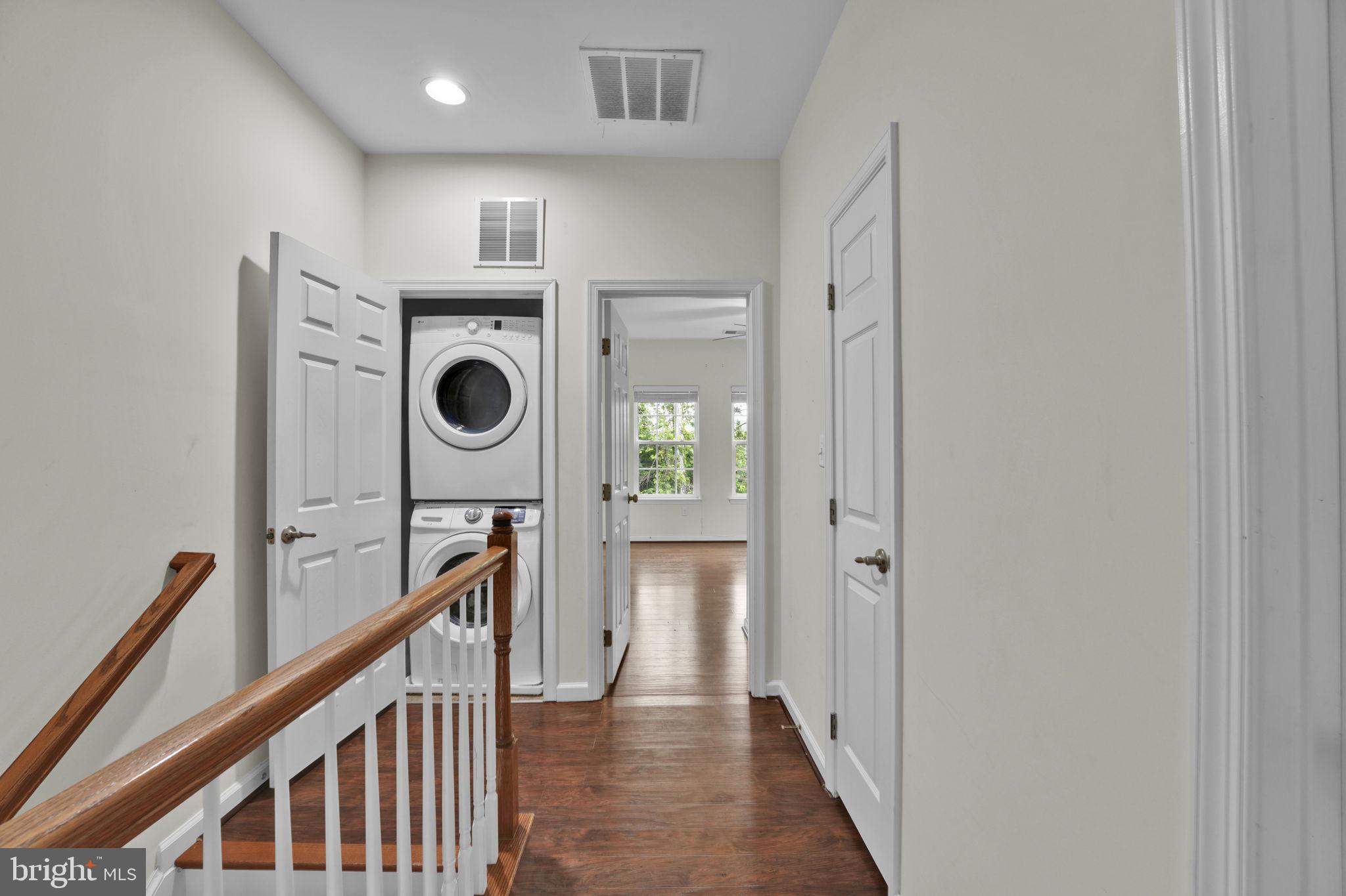 7138 Station House Road Elkridge, MD 21075 - Photo 11 of 42 a view of a hallway with washer and dryer