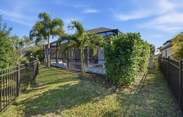 a living room with furniture kitchen view and a table